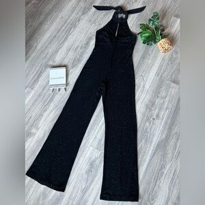 Vintage XOXO 90s glitter halter neck keyhole wide leg jumpsuit in black. Size M